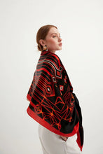 Charger l&#39;image dans la galerie, Discover the harmony of tradition and contemporary elegance with this timeless crepe silk shawl. This large shawl with mythological motifs, radiates warmth through red, black and white main colours, evoking a vibrant energy and life-giving power .
