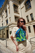 Load image into Gallery viewer, Silk Crepe Scarf &amp; Bandana - ART &amp; SOUL Collection Design being homage to the art of ballet, the interplay of deep green, blue and yellow reflects the delicate precision of ballet in this silk crepe scarf.
