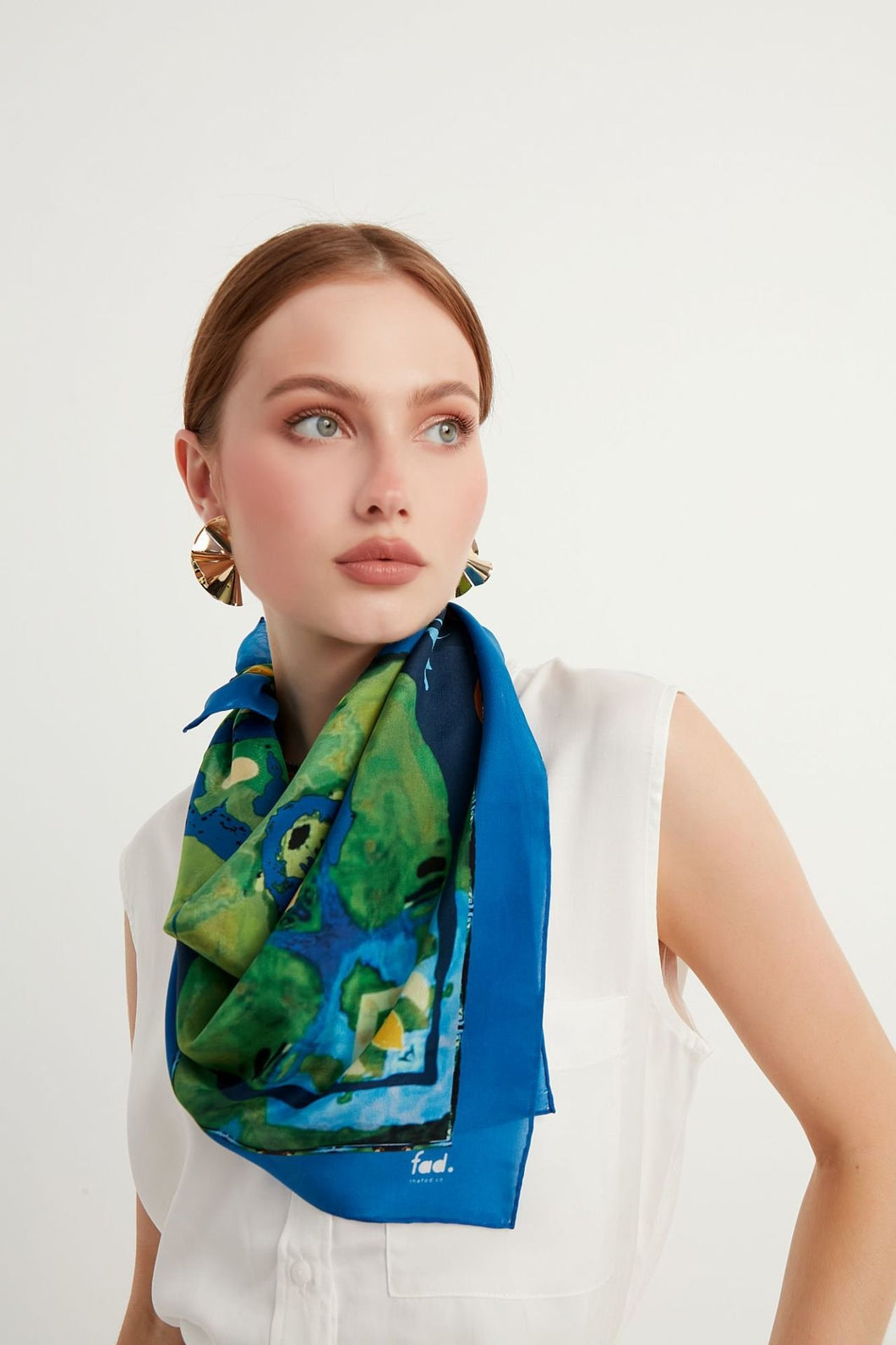 Silk Crepe Scarf & Bandana - ART & SOUL Collection Design being homage to the art of ballet, the interplay of deep green, blue and yellow reflects the delicate precision of ballet in this silk crepe scarf.